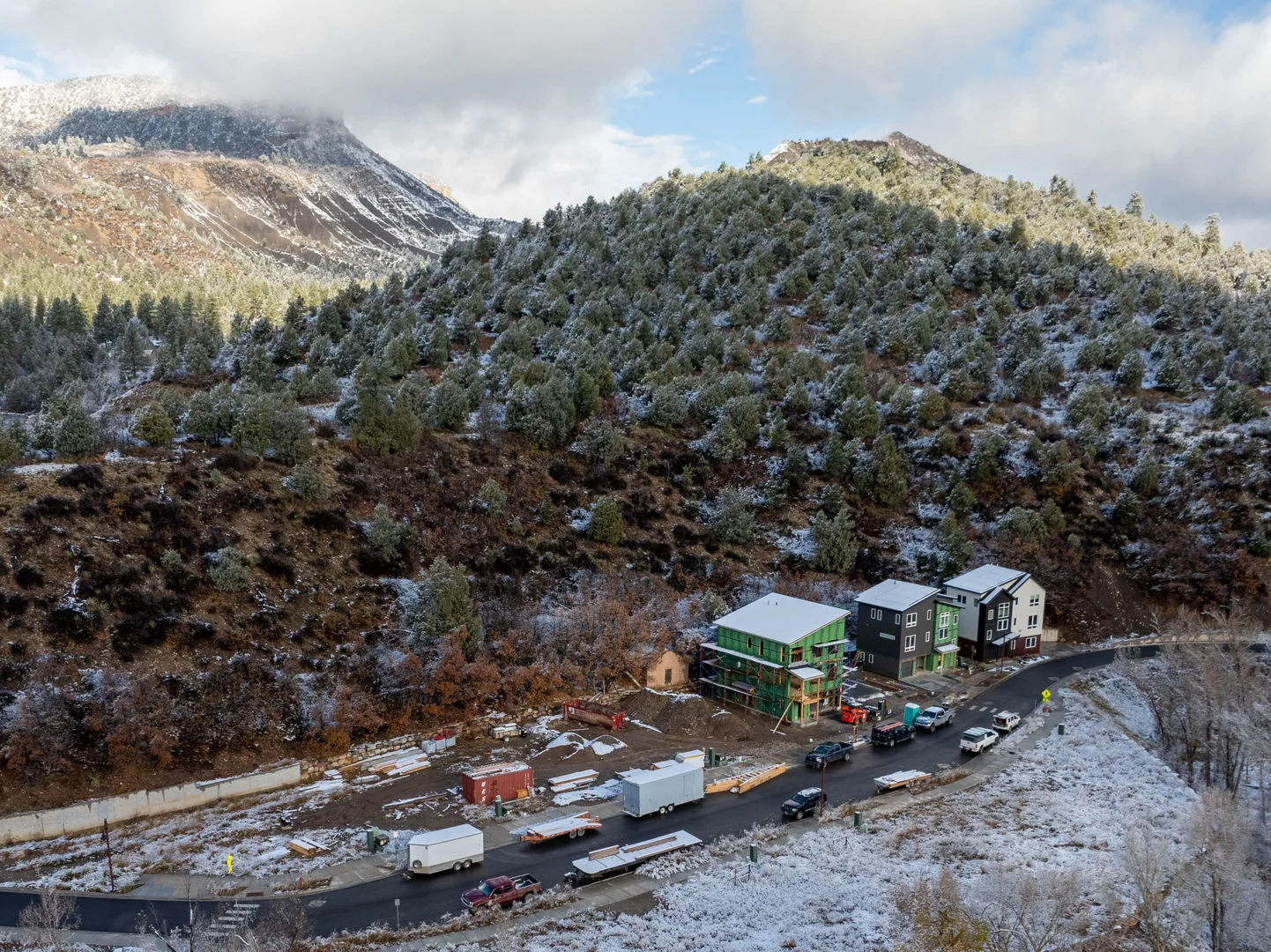 Aerial view of Sutter Homes boutique neighborhood near Durango with mountain backdrop